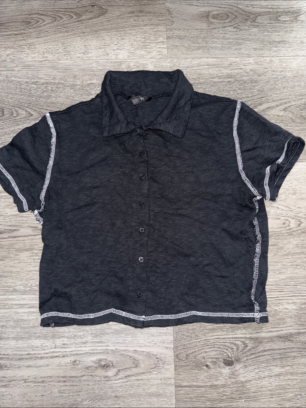 Black top with white stitching